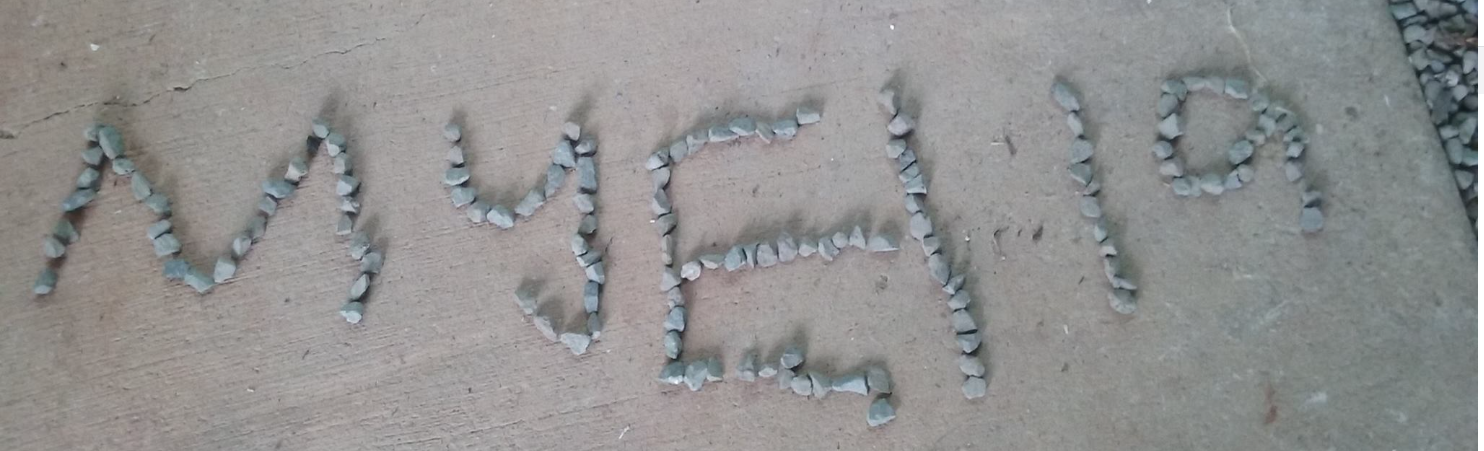 Picture of rocks shaped into the word Myella was made by a child having a family friendly holiday with us.  This child thought the rocks were perfect and just 4 kids.