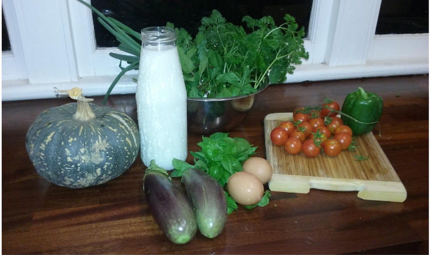 Picture of home grown ingredients - another reason Myella is a great place to eat near Baralaba and Woorabinda.  Eggs, milk and pumpkin, cherry tomatoes, egg plant, basil and capsicum.